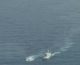 Guardia costiera libica spara contro barcone migranti, le immagini